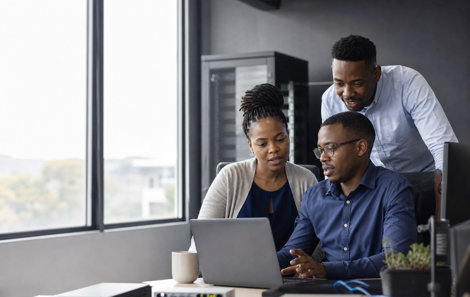 Black South African technology professional working in a contemporary business environment